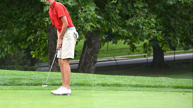 Sophomore Liam McGrath watches his putt on the green at the Joseph H. Patterson Cup Qualifier in August 2016. | COURTESY / CONOR MCGRATH