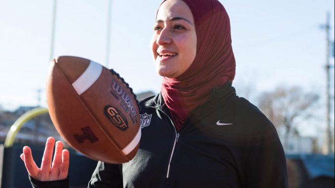 Ameena Soliman, a 2017 finance and marketing alumna, poses at Chodoff Field at 10th and Diamond streets on Sunday. She spent the 2017 season as a graduate assistant in operations and recruiting at Temple and now works at the NFL office in New York City. | SYDNEY SCHAEFER / THE TEMPLE NEWS