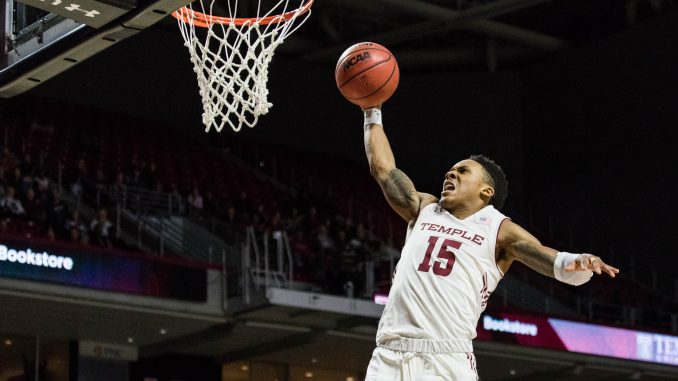 Freshman guard Nate Pierre-Louis dunks on a fastbreak during Temple’s 75-72 overtime loss to Memphis on Saturday at the Liacouras Center. | SYDNEY SCHAEFER / THE TEMPLE NEWS