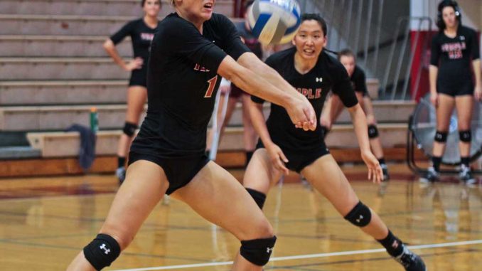 Sophomore Tiffany Connatser fulfills the role of team setter, improving team chemistry. ( TIMOTHY VALSHTEIN / TTN )