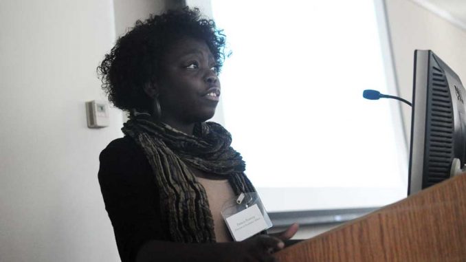 Temple Student Government’s Patricia Boateng speaks about issues concerning the general education program at the meeting yesterday, Oct. 22. | ABI REIMOLD / TTN