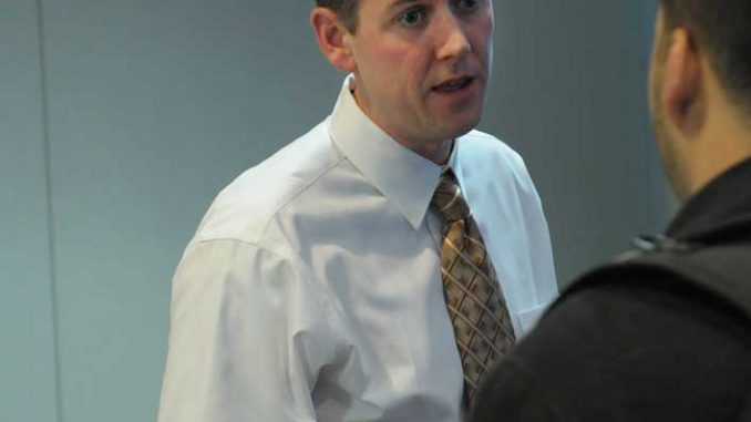 Chris Carey of Student Activities discussed a food drive at the TSG meeting Monday. | ABI REIMOLD / TTN Chris Carey of Student Activities discussed a food drive at the TSG meeting Monday. | ABI REIMOLD / TTN