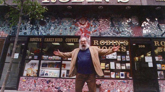 Larry Robin, owner of Robin’s Bookstore, stands outside his North 13th St. store in the ‘70s. | COURTESY GREG JONES