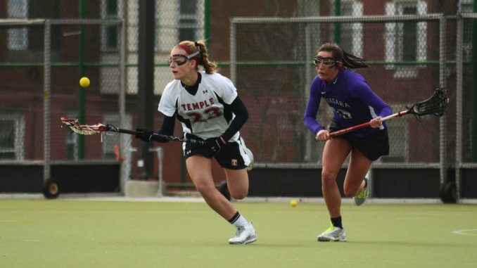 Freshman midfielder Bridget Hufnagel controls a ball against Niagara. Freshmen combined to score five of the Owls’ 18 goals as they took the season opener 18-5. | MAGGIE TRAPANI / TTN