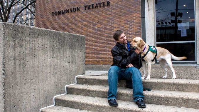 Theater major Josh Kachnycz received his service dog, Lavender, to help with his sleep apnea and gain independence. | LUIS FERNANDO RODRIGUEZ