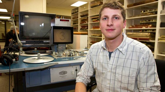 Jon Kohl, a film and media arts and history double major, has worked at Paley’s Urban Archives since January 2011. The student uses his knowledge of archival footage in his position as an assistant producer and researcher of a Philadelphia documentary. Jon Kohl operates the reels in Urban Archives. Kohl’s job includes sifting through boxes of film containing footage that no one has seen in decades. He once discovered footage from a Beatles concert in Philadelphia. | Steve Reitz / TTN