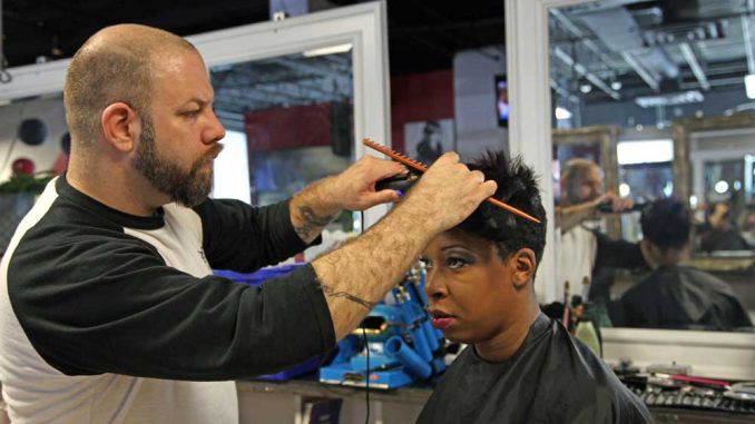 Hairstylist Wade Lee Richards recently relocated to Philadelphia. Richards said he is excited to work with a diverse clientele at Mecca Unisex Salon. | KELSEY DUBINSKY / TTN