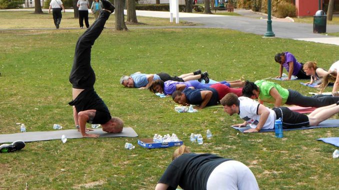 Diamond Dallas Page hosted a free outdoor session of his yoga program at Ambler on April 10. The former professional wrestler is now a professional trainer. | JOHN CORRIGAN / TTN