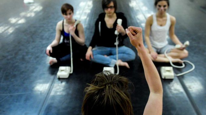 Megan Mizanty choreographs her dancers through her MFA thesis piece, “An Attachment.” Mizanty’s piece was inspired by observing her students’ needs to always be on their phones. | ABI REIMOLD / TTN