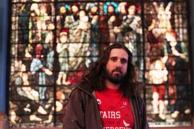 Matt Miceli, First Unitarian Church’s building superintendent, sees the juxtaposition of charitable events by day, and punk DIY shows by night. | Kara Milstein TTN