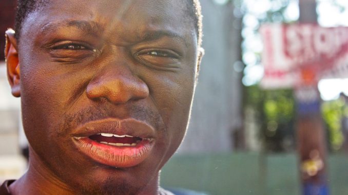 A Philadelphia CeaseFire member photographed by Nidaa Husain, an former international student from South Africa, for her work shooting Philly’s gun epidemic. | Courtesy Nidaa Husain