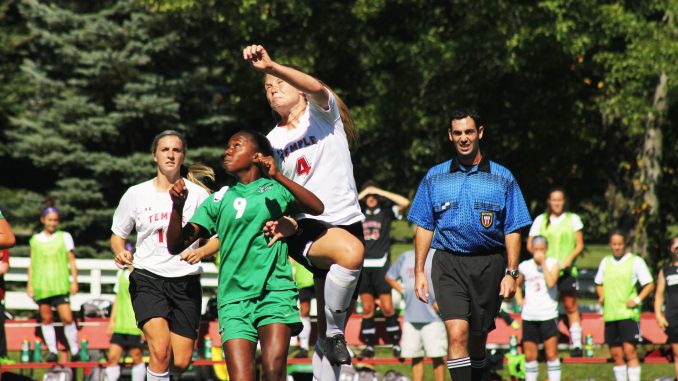 Senior midfielder Amanda Ward (right) and her team lost in the home opener to Marshall 1-0. The Owls began the season with four straight shutouts, a program record. | Aja Espinosa TTN