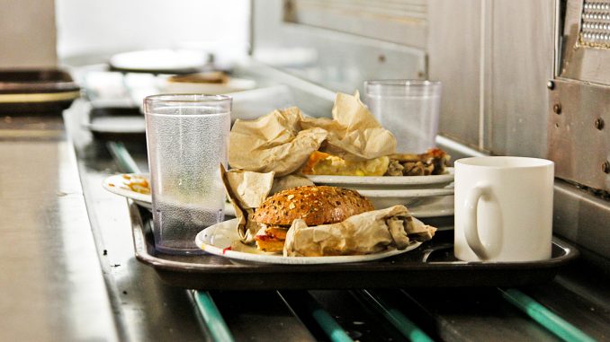 Food and watse is piled along the collection line in the Johnson and Hardwick Cafeteria. Sodexo has several policies to discourage students from wasting food. | Timothy Valshtein TTN