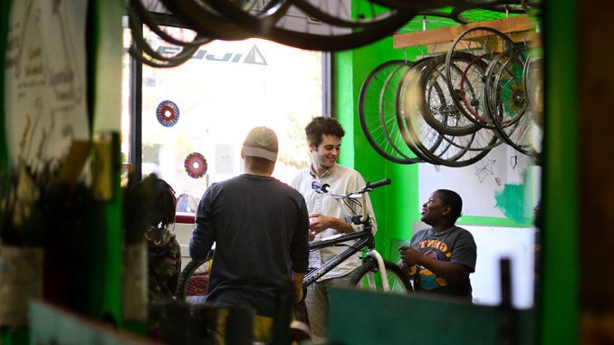 Philadelphia children gathered at Neighborhood Bike Works on Nov. 6 to learn how to repair bikes. Their service hours go towards getting their own bike. | Skyler Burkhart TTN