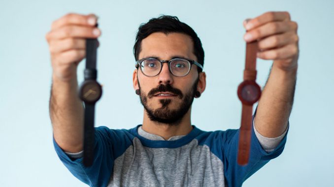 Creator of Analog Watch Co., Lorenzo Buffa, holds prototypes of his watch from the Carpenter Collection at his soon-to-be storefront in South Philly. | Kara Milstein TTN