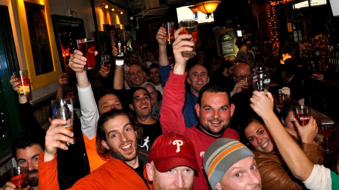 Members of the Fishtown Beer Runners celebrated a successful five-kilometer run at Kelliann’s Bar & Grill on 16th and Spring Garden Streets on Nov. 14. | Jacob Colon TTN