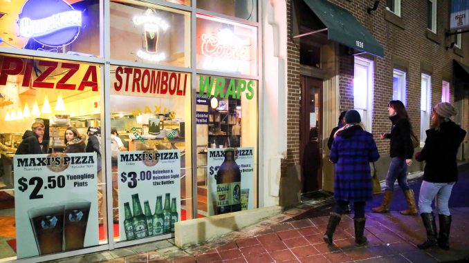 Maxi’s, a popular campus bar and eatery, was busted for serving nine underaged patrons, four of whom were caught using fake IDs. The LBC has yet to file a violation against the establishment. | Hua Zong TTN