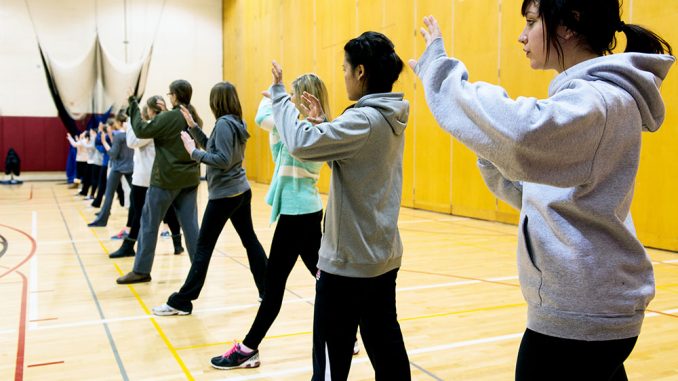 Personal Defense for Women, a kinesiology class, prepares female students to be alert, along with teaching skills like hand strikes and kicks. Students learn to defend themselves from elbow strikes, wrist grabs and chokeholds in the class curriculum. | Eric Dao TTN