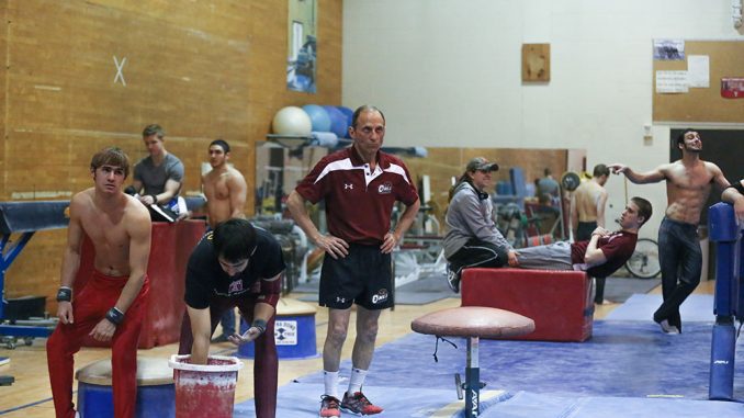 The men’s gymnastics team has won two straight Eastern College Athletic Conference titles. The squad has led athletics in GPA for much of the past three years. | Hua Zong TTN