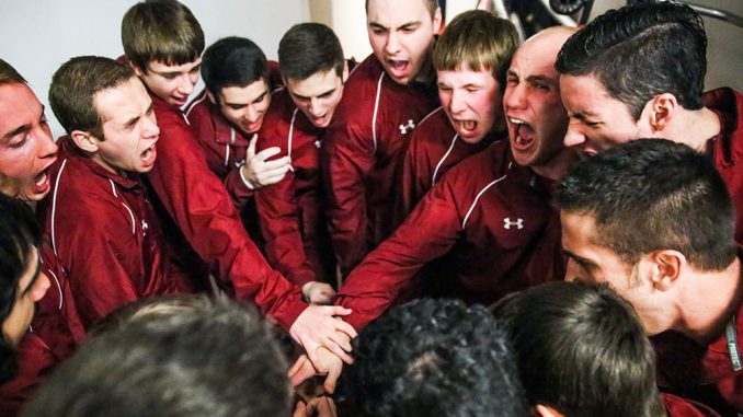 Members of the men’s gymnastics team prepare for their final home meet. | Hua Zong TTN