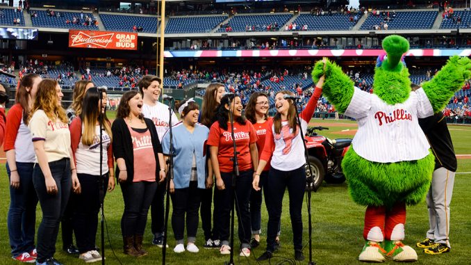 Singchronize performed the national anthem at the Phillies game last Friday and was joined by the Phillie Phanatic. | ANDREW THAYER TTN Singchronize performed the national anthem at the Phillies game last Friday and was joined by the Phillie Phanatic. | ANDREW THAYER TTN