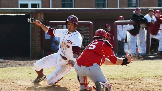 Robert Amaro (left) slides into home plate during Temple’s comeback victory against Saint Peter’s College. Amaro is batting .292 and leading the Owls with 13 RBIs after a three-year career at the University of Virginia. | Andrew Thayer TTN