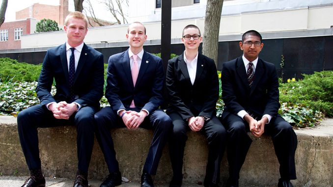 Officers of the academic fraternity Gamma Iota Sigma-Sigma shaved their heads during Philly I-Day to raise money for children battling cancer. | Kristen Vanleer TTN