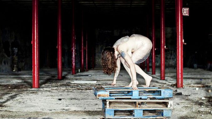 Absolutely Naked Woman Posing Inside an Old Abandoned Building