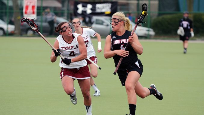 Sophomore midfielder Kara Stroup runs across Geasey Field during a loss to Louisville.| ANDREW THAYER TTN