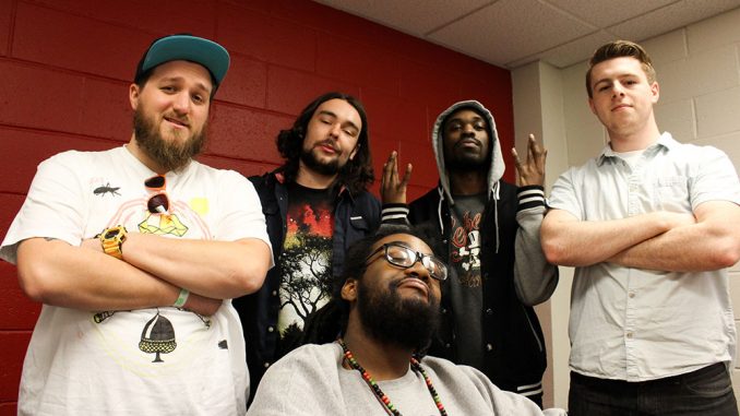 (From right) Rappers P64, Buggie Fresh, Prophet Lethal Dose and OHM (front) collaborate with the help of DJ Cody Griz (far left) to form the Hungry Ghosts.| Claire Sasko TTN