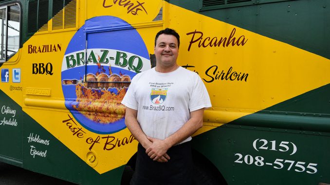 Adriano Redante brings his truck, Braz-BQ, to Main Campus twice a week. He made a deal with Debbie Dasani, another truck owner, to share parking.| Sash Schaeffer TTN