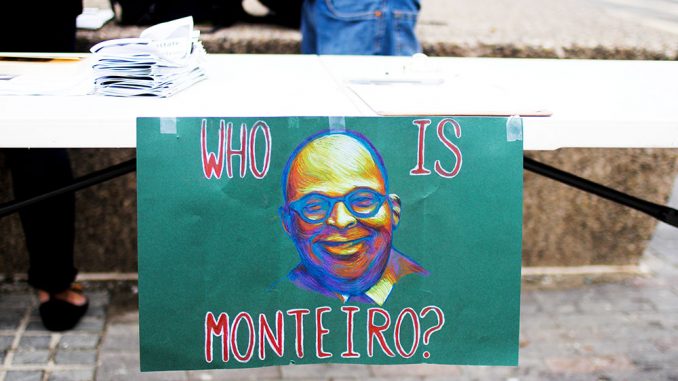 Students for Monteiro promoted its cause at a booth set up near the Bell Tower last week. Members are planning to hold a walk-out and protest in the same location on Wednesday, April 9. | Alexis Wright-Whitley TTN