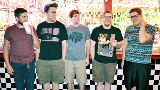 Members of the five-piece band, Uncle/Father Oscar, are entering the emo-punk band scene in Philadelphia with a new split with A Day Without Love. Jared Whalen | TTN