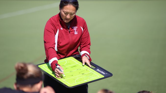 Owls coach Amanda Janney talks to the team during halftime of Temple's 2-0 loss to Penn State on Saturday, Oct. 5 at Geasey Field. | Andrew Thayer TTN