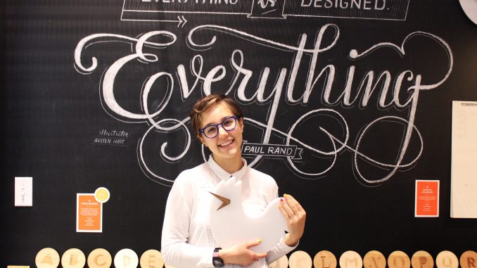 Jess Ruggierio, a student in Tyler’s entrepreneurial design program, holds her chicken clock in The Hatchery, a new showcase of student designs which opened on Oct.10. Emily Scott | TTN