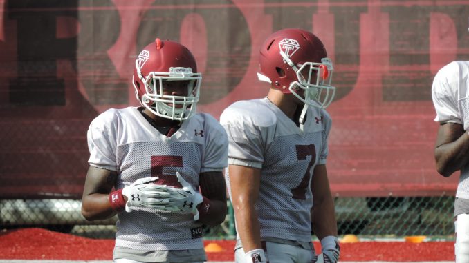 Jalen Fizpatrick (left) and John Christopher (right) participate in practice Tuesday. | Nick Tricome TTN