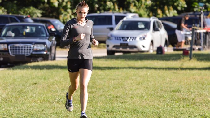 Freshman distance runner Katie Pinson jogs at Belmont Plateau during the Big 5 Invitational earlier this season. Greg Frangipani | TTN