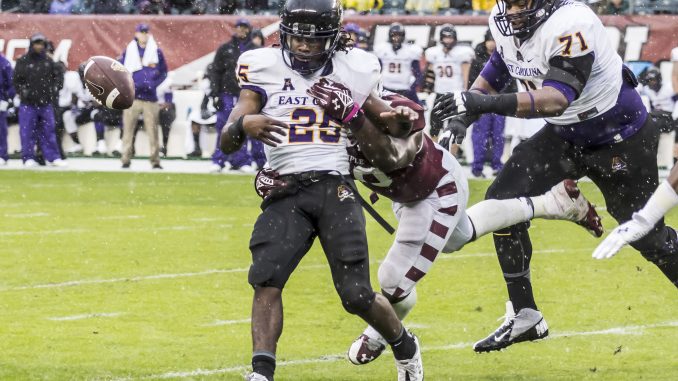 Redshirt-junior Praise Martin-Oguike forces a fumble against senior running back Breon Allen in the Owls’ 20-10 victory. Donald Otto | TTN