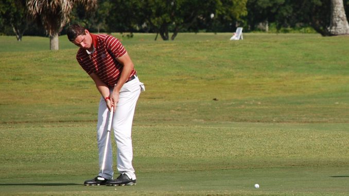 Brandon Matthews puts a golfball during the 2014 Dixie Amateur, held in Floria this past December. | COURTESY Brandon Matthews