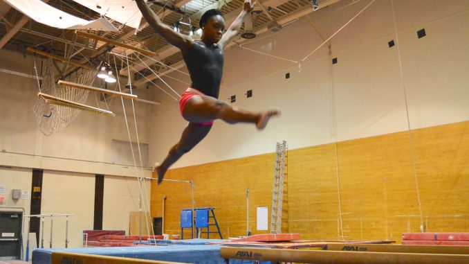 Sophomore all-around Briana Odom practices on the balance beam. | Sasj Schaeffer TTN