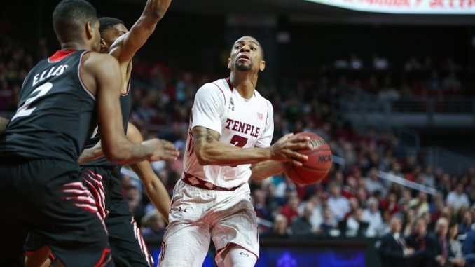 Senior guard Jesse Morgan holds the ball on offense in Temple's 75-59 triumph against Cincinnati Tuesday. Morgan had 12 points in the win. | Jenny Kerrigan TTN