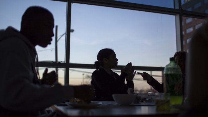 Philadelphia high school students involved in NYPAC meet in an office in Temple Contemporary to plan an anti-bullying workshop. | KARA MILSTEIN TTN