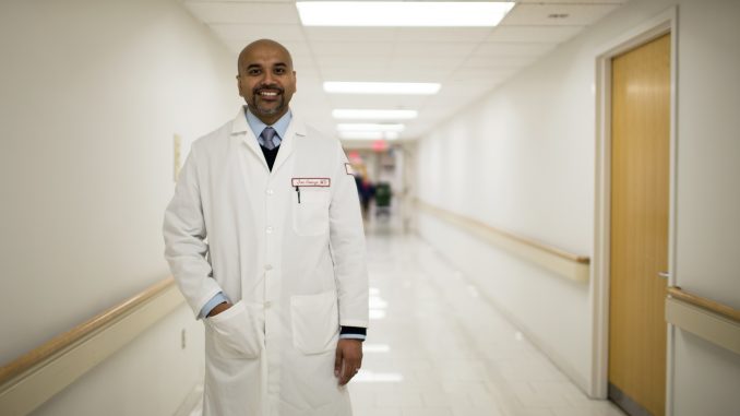 Dr. Jon C. George, an interventional cardiologist and an adjunct professor, stands in Temple University Hospital. George is in charge of a nationwide clinical trial. | Kara Milstein TTN