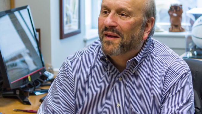 Professor and chair of the legal studies department Sam Hodge sits in his office. | Tanvir Saurav TTN