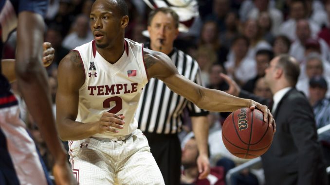 Senior guard Will Cummings dribbles the ball on the offensive end against Connecticut in the Owls’ 75-63 win on March 7. | Donald Otto TTN