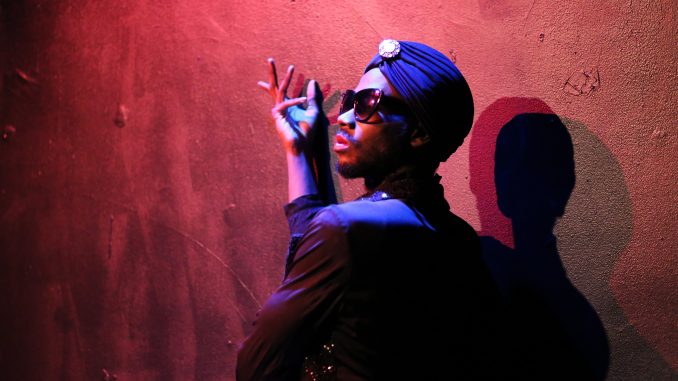 Darryl Gene Daughtry Jr. performs “The Gospel According to Miss Roj” scene in “The Colored Museum,” at Randall Theatre on April 12. | Kara Milstein TTN