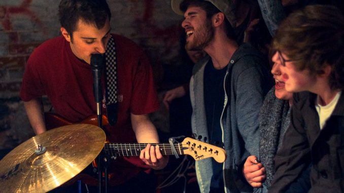 Members of the audience sing along to emo/punk band Marietta’s set at Lavender Town on March 28. | Emily Dubin TTN