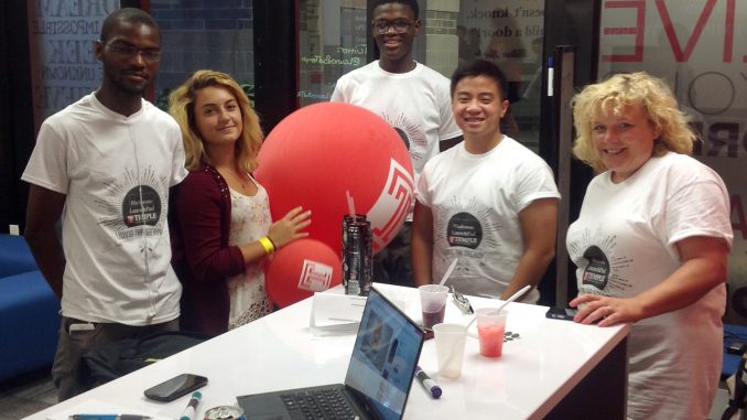 Nicodemus Madehdou (left), Ololade Bello and Jose Hernandez of JumpButton Studio pose with Blackstone LaunchPad Program Director Julie Stapleton Carroll. | COURTESY Blackstone Launchpad Temple