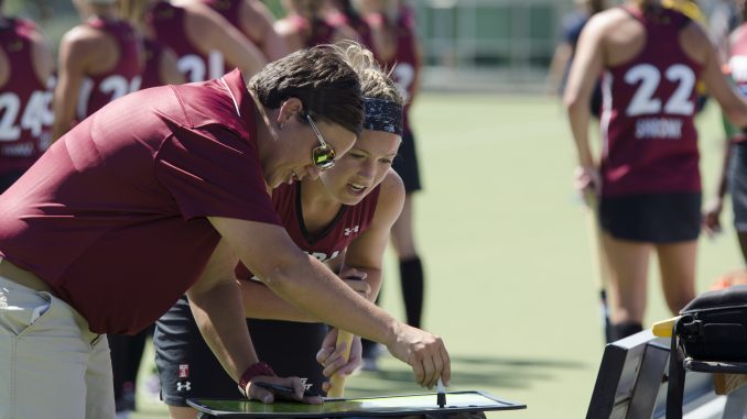 FieldHockey_Sports_8.25_MargoReed_03 Coach Marybeth Freeman talks with sophomore midfielder Rachael Mueller during the team’s 1-0 victory over Drexel University in a scrimmage last Saturday. | Margo Reed TTN
