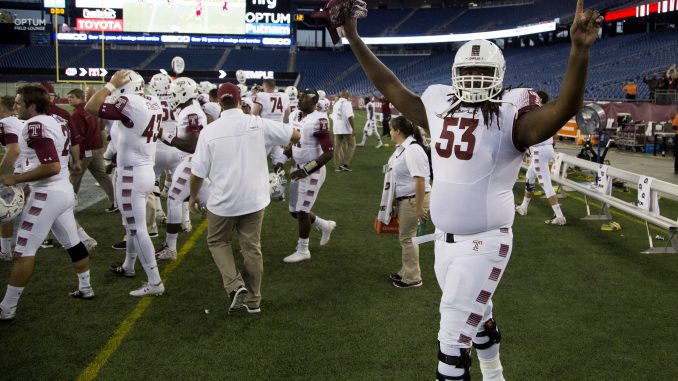 Redshirt-sophomore Leon Johnson celebrates the Owls 25-23 victory against UMasss at Gillette Stadium Saturday. | Jenny Kerrigan TTN